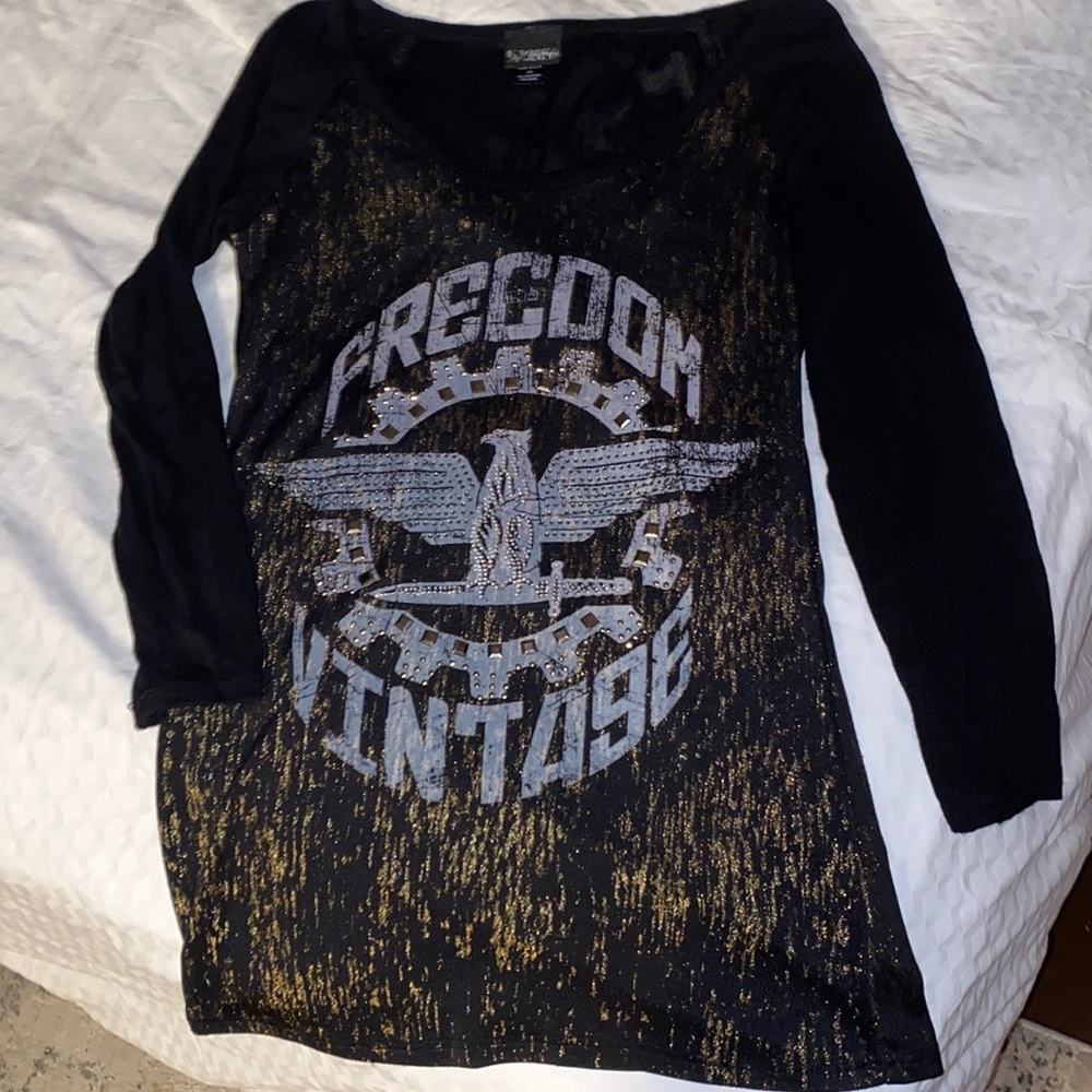 Black and gold bezeled top